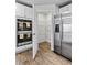 A modern kitchen featuring stainless steel appliances, double ovens and a walk-in pantry at 669 Egrets Lot 56 Lndg, Covington, GA 30014