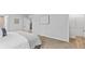 Neutral main bedroom with walk-in closet and en-suite bathroom access at 669 Egrets Lot 56 Lndg, Covington, GA 30014