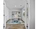 Bright office space featuring a white desk, shelving, and natural light from the window at 669 Egrets Lot 56 Lndg, Covington, GA 30014