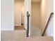 Carpeted staircase featuring modern railing and access to the upper level at 669 Egrets Lot 56 Lndg, Covington, GA 30014