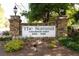 The Summit Condominium Homes sign in stone with professional landscaping at 5141 Roswell Rd # 7, Atlanta, GA 30342
