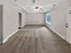 Spacious finished basement with carpet flooring and a window for natural light at 6367 Deshong Dr, Lithonia, GA 30058