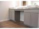 Bathroom with dual sink vanity, granite countertop and tile floors at 679 Egrets Landing Lot 57, Covington, GA 30014