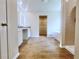 An elegant bathroom features a double vanity, soaking tub, and walk-in shower at 679 Egrets Landing Lot 57, Covington, GA 30014