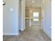 Bright kitchen space with modern appliances and eat-in area, featuring stylish pendant lighting at 679 Egrets Landing Lot 57, Covington, GA 30014