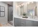 Elegant bathroom features double vanity, modern lighting, and a glass-enclosed shower, offering a spa-like retreat at 962 Bibbs Nw Cir # 8, Atlanta, GA 30318