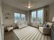 Bright Bedroom with three large windows, soft neutral colors, and a white baby crib at 962 Bibbs Nw Cir # 8, Atlanta, GA 30318