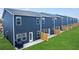 Townhome backyard featuring a privacy fence and green lawn, perfect for outdoor enjoyment and relaxation at 11569 Kimberly Way # 26, Hampton, GA 30228