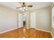 Light-filled bedroom featuring hardwood floors and ample closet space at 1316 Sanders Dr, Morrow, GA 30260