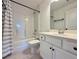 Bathroom featuring tub-shower combo and single vanity at 5515 Allegre Pl, Cumming, GA 30028