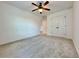Bedroom with carpet flooring, closet and ceiling fan at 5515 Allegre Pl, Cumming, GA 30028