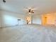 Spacious bedroom with carpet flooring and ceiling fan at 5515 Allegre Pl, Cumming, GA 30028