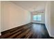 Bright dining room with hardwood floors and chandelier at 5515 Allegre Pl, Cumming, GA 30028