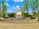 Landscaped entrance to Brookview community featuring stone monument and colorful flower beds at 5515 Allegre Pl, Cumming, GA 30028
