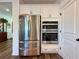 Contemporary kitchen boasting stainless steel appliances and built-in oven at 5515 Allegre Pl, Cumming, GA 30028