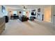 Expansive living room featuring comfortable seating and plenty of natural light from double windows at 5515 Allegre Pl, Cumming, GA 30028