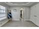 Bedroom with a closet, a ladder with a throw blanket, and a sun-filled window at 5976 Princeton Run Trl, Tucker, GA 30084