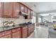 Gourmet kitchen features stainless steel appliances, granite countertops, and custom cabinetry at 5976 Princeton Run Trl, Tucker, GA 30084
