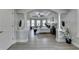 Bright main bedroom featuring decorative columns, tray ceiling, and lots of natural light at 5976 Princeton Run Trl, Tucker, GA 30084