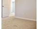 Bedroom with neutral walls, white trim, carpeted floors, and doorway to hallway at 685 Egrets Lot 58 Lndg, Covington, GA 30014