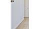 A white hallway with carpet flooring and a white paneled door at 685 Egrets Lot 58 Lndg, Covington, GA 30014