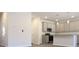 Bright kitchen featuring stainless appliances, gray cabinets, and a granite-topped island at 685 Egrets Lot 58 Lndg, Covington, GA 30014
