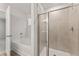 Bathroom featuring a shower with glass doors and a separate soaking tub at 7099 Brushwood Bend (Lot 49), Lithonia, GA 30058