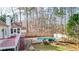 Spacious fenced backyard with a private pool area and a multi-level deck, perfect for outdoor entertaining at 1074 Fieldstone Dr, Canton, GA 30114