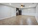 A basement kitchenette featuring a window, cabinets, sink, counter space, and a refrigerator at 1074 Fieldstone Dr, Canton, GA 30114