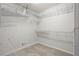 Walk-in closet with built-in shelving offering ample storage space at 1074 Fieldstone Dr, Canton, GA 30114