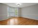 Open dining area with hardwood floors and large windows for natural light at 1074 Fieldstone Dr, Canton, GA 30114