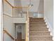 Spacious entryway with high ceilings, a staircase, and neutral paint at 1074 Fieldstone Dr, Canton, GA 30114