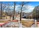 The home sits on a landscaped lot with a winding driveway and mature trees at 1074 Fieldstone Dr, Canton, GA 30114