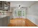 Bright eat-in kitchen featuring granite countertops, stainless steel faucet, and a beautiful bay window at 1074 Fieldstone Dr, Canton, GA 30114