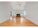 Bright living room with hardwood floors and a cozy fireplace at 1074 Fieldstone Dr, Canton, GA 30114