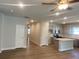 Spacious open layout showcases modern kitchen with stainless steel appliances and expansive living area for entertainment at 2108 Amaryllis Dr, Grayson, GA 30017