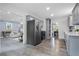 Open concept kitchen with a seamless transition to the living and dining spaces, creating an ideal layout for entertaining at 2724 Bomar Rd, Douglasville, GA 30135