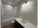 Modern bathroom featuring a vanity with a single sink and a shower-tub combination at 455 Firefly Cir # 39, Alpharetta, GA 30009