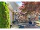 Charming front porch with stone accents, decorative door wreath, and seating at 207 Cole Ct, Canton, GA 30114
