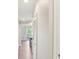 Hallway with hardwood floors leading to balcony at 2277 Peachtree Ne Rd # 310, Atlanta, GA 30309
