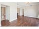 Living room with hardwood floors, showing the entry and bathroom at 2277 Peachtree Ne Rd # 310, Atlanta, GA 30309