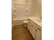 Bathroom featuring a tub and a vanity with a modern faucet at 445 Firefly Cir # 40, Alpharetta, GA 30009