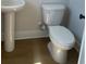 Clean and modern bathroom featuring pedestal sink and modern toilet at 445 Firefly Cir # 40, Alpharetta, GA 30009