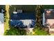 An aerial view showcases the home's roof and surrounding yard with mature trees at 5789 Star Flower Dr, Ellenwood, GA 30294