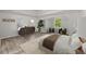 Bright main bedroom boasts hardwood floors, two chairs, an area rug and dresser at 5789 Star Flower Dr, Ellenwood, GA 30294