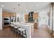 Modern kitchen with a large island, stainless steel appliances, and stylish cabinetry at 114 Briargate Dr, Johns Creek, GA 30097