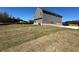 Expansive backyard with views of the home's siding and ample yard space at 184 Weldon Rd, Mcdonough, GA 30253