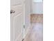 Bright hallway with wood-look floors at 184 Weldon Rd, Mcdonough, GA 30253