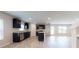 Contemporary kitchen with granite countertops, stainless steel appliances, and an inviting open layout at 184 Weldon Rd, Mcdonough, GA 30253