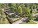 Aerial view showcases the house and the surrounding mature trees at 2210 Leafmore Dr, Decatur, GA 30033
